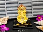 Lord Ganesha in Yellow & Gold Idol