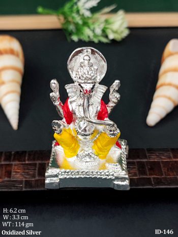 Bright Ganesha Idol in Yellow Dhoti & Red Angavastra